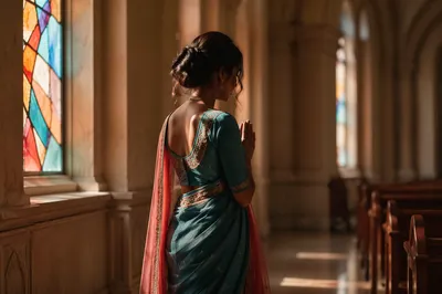 South Asian Woman Praying in Church Aisle