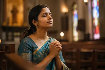 South Asian Woman Praying in Church