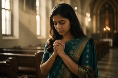 South Asian Woman Praying in Church