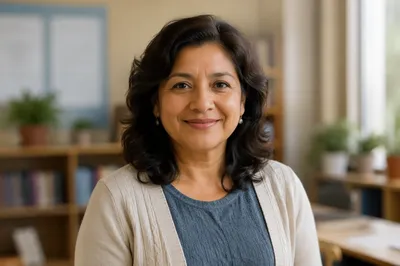 Friendly Teacher Portrait in Bright Classroom