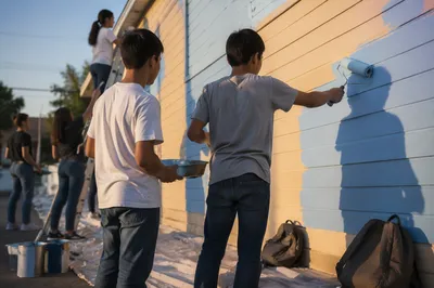 Teens Repainting Building on Mission Trip