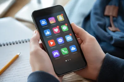 Teen Student Checking Social Media at Desk