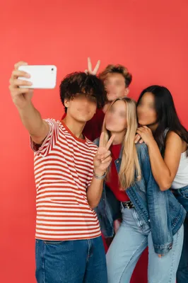 Diverse Teen Friends Taking Playful Selfie