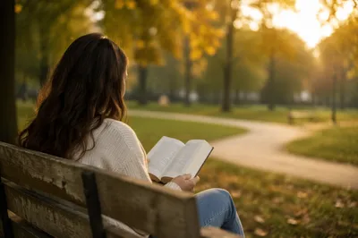 Young Adult Reading Bible on Park Bench