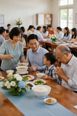 Vietnamese Families Sharing Meal in Church Hall