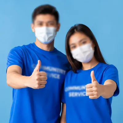 Volunteer Team in Matching Blue Shirts