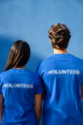 Volunteer Team in Matching Blue Shirts