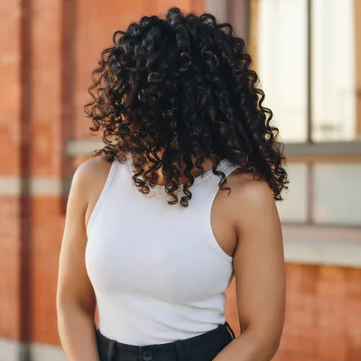 Confident Woman With Natural Curly Hair