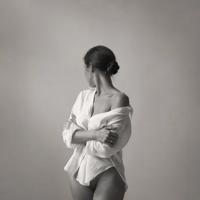 Confident Woman Portrait in Soft Gray