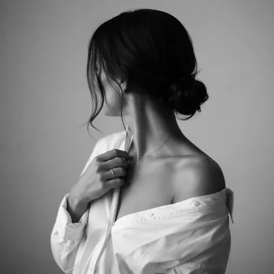 Confident Woman Portrait in Monochrome Studio