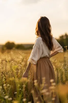 Confident Woman in Golden Wildflower Meadow