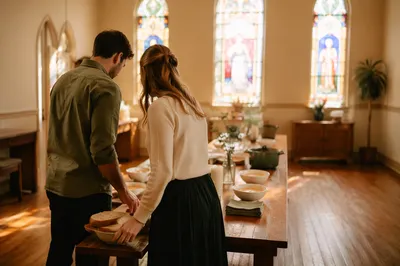 Young Married Couple Serving in Church Hall