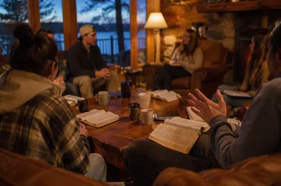 Youth Retreat Bible Discussion in Rustic Cabin