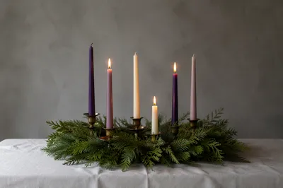 Warm Advent Candles with Evergreen Wreath