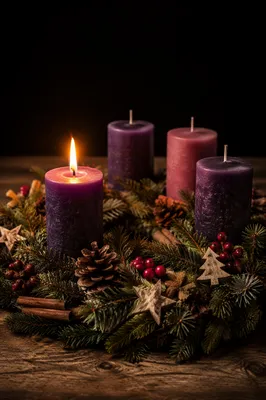 First Lit Purple Candle on Advent Wreath