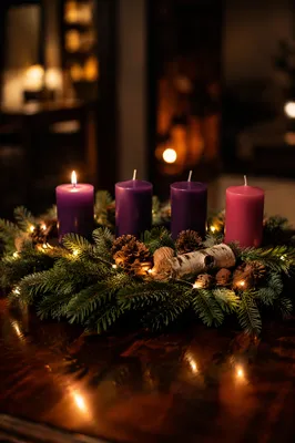 First Lit Purple Candle on Advent Wreath
