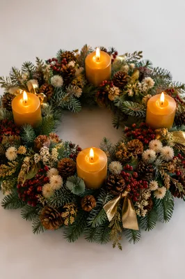 Lit Advent Wreath with Four Golden Candles