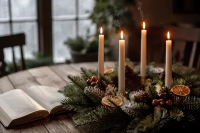 Lit Advent Wreath on Rustic Winter Table