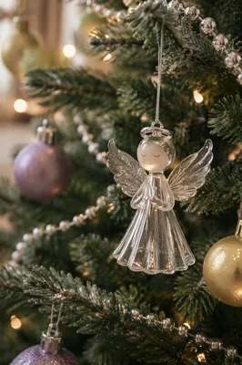 Glass Angel Ornament on Christmas Evergreen