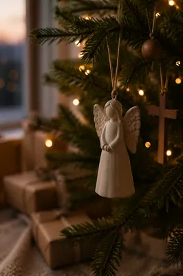 Angel Ornament on Christmas Tree Branch