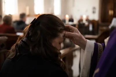 Ash Wednesday Forehead Cross in Quiet Church
