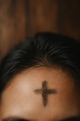 Ash Wednesday Forehead Cross in Soft Light