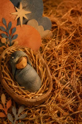 Baby Jesus Figurine in Straw Manger