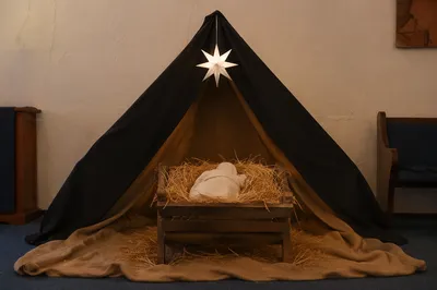 Baby Jesus Manger in Church Nativity Display