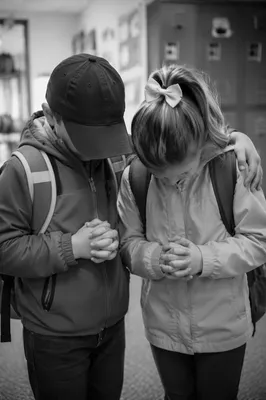 Children Praying Before School in Monochrome