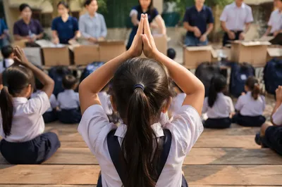 Children Praying in School Courtyard
