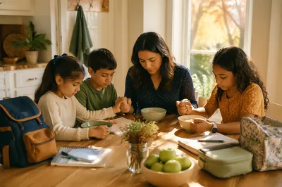 Mother and Schoolchildren Praying at Breakfast Table