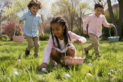 Children Hunting Easter Eggs in Sunny Park