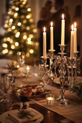 Warm Christmas Candlelit Table with Golden Bokeh