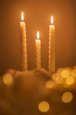 Warm Christmas Candles with Golden Bokeh