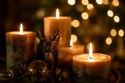Warm Christmas Candles with Golden Bokeh