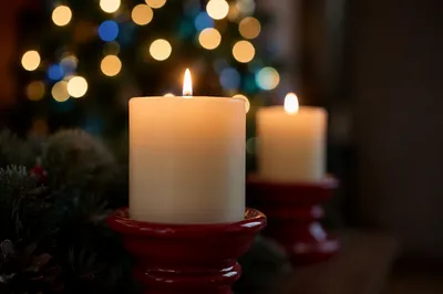 Warm Christmas Candles With Festive Bokeh