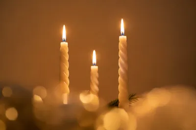 Warm Christmas Candles with Golden Bokeh