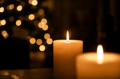 Warm Christmas Candlelight with Golden Bokeh