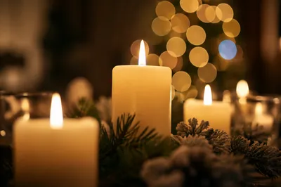 Warm Christmas Candles with Golden Bokeh