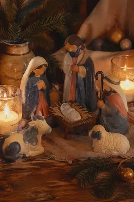 Candlelit Handmade Nativity on Rustic Table