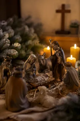 Candlelit Christmas Nativity on Rustic Table