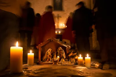 Candlelit Nativity in Rustic Chapel