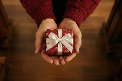 Christmas Gift Offering in Church Hands