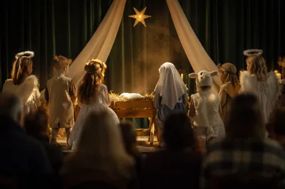 Children's Christmas Pageant Around Rustic Manger