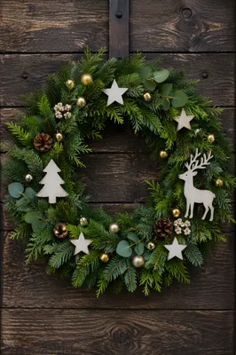 Christmas Wreath on Rustic Wooden Door