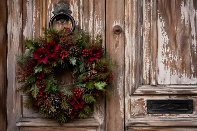 Christmas Wreath on Rustic Wooden Door