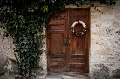 Christmas Wreath on Rustic Wooden Door