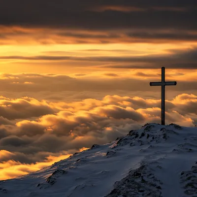 Easter Cross Sunrise Over Snowy Mountain Clouds