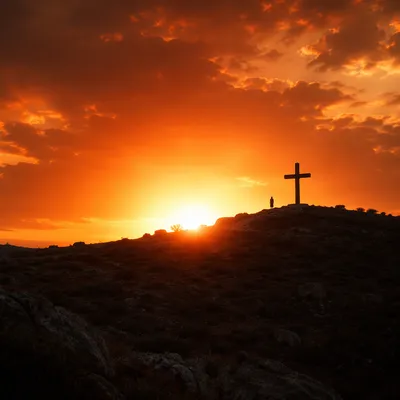Easter Cross Silhouette at Dramatic Sunrise