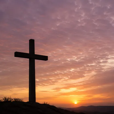 Easter Cross Silhouette at Dramatic Sunrise